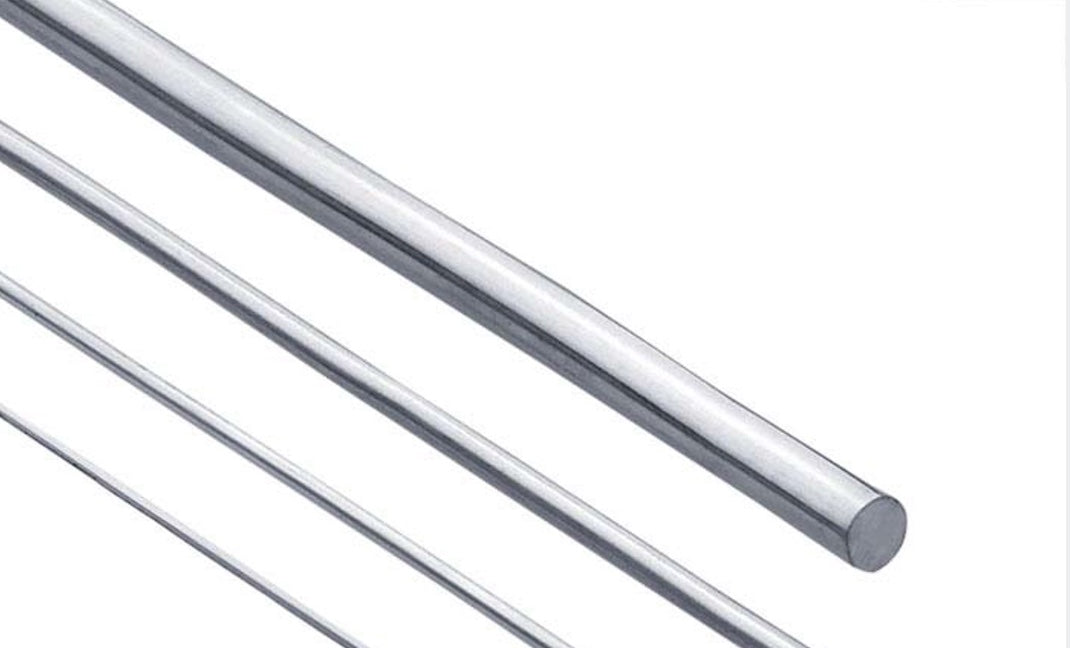 A set of fine silver wires in various thicknesses, displayed side by side against a white background.