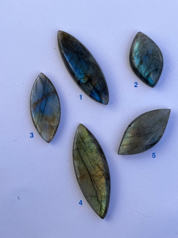 Labradorite Marquise/Eye Cabochons with vering Blue, orange, yellow and purple flash.