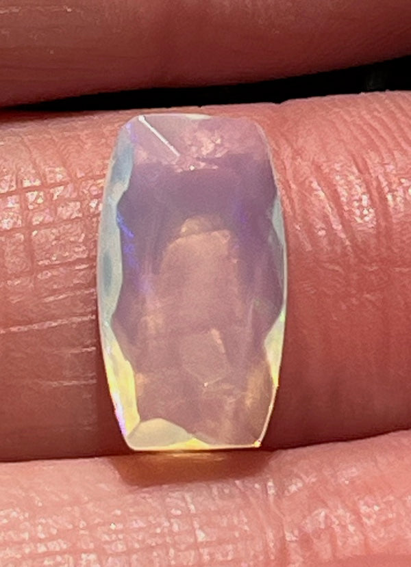 Opals, cushion rectangle shape, pink, blue and yellow flash.