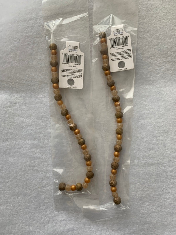 Bead, glass, 7" strand, amber and green colour