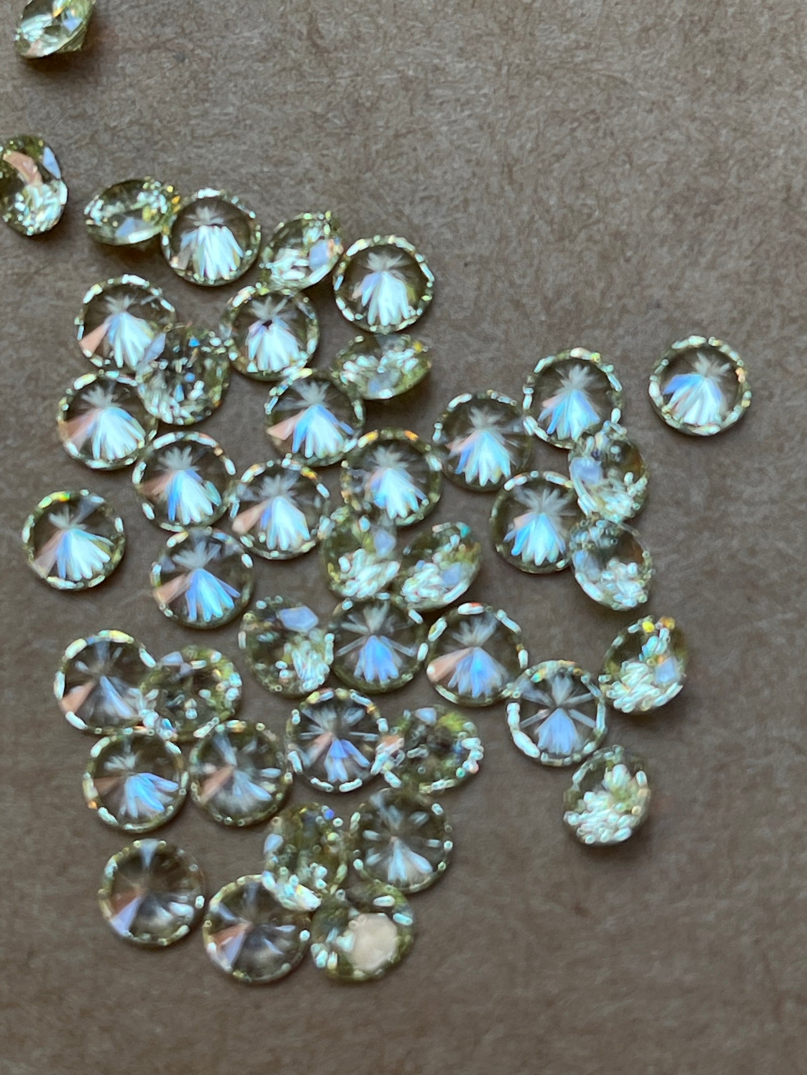Yellow/Green Cubic Zirconias Round - Various Sizes