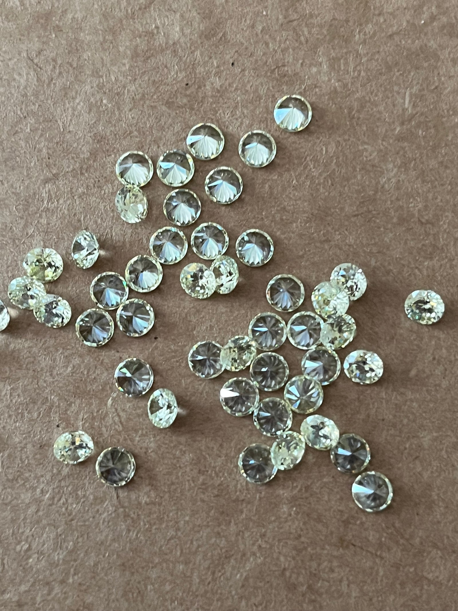 Yellow/Green Cubic Zirconias Round - Various Sizes