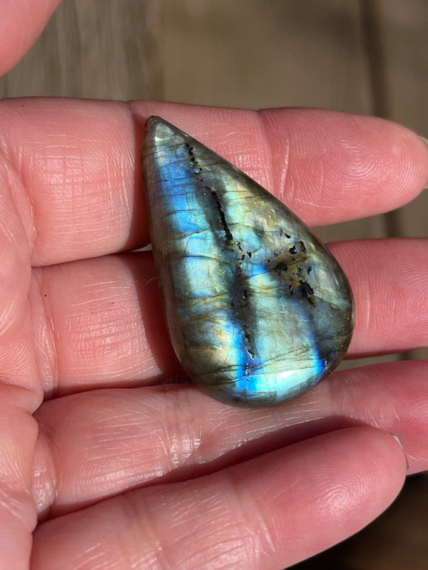 Labradorite Teardrop, Pear Cabochons with varing Blue, orange, yellow and purple flash.