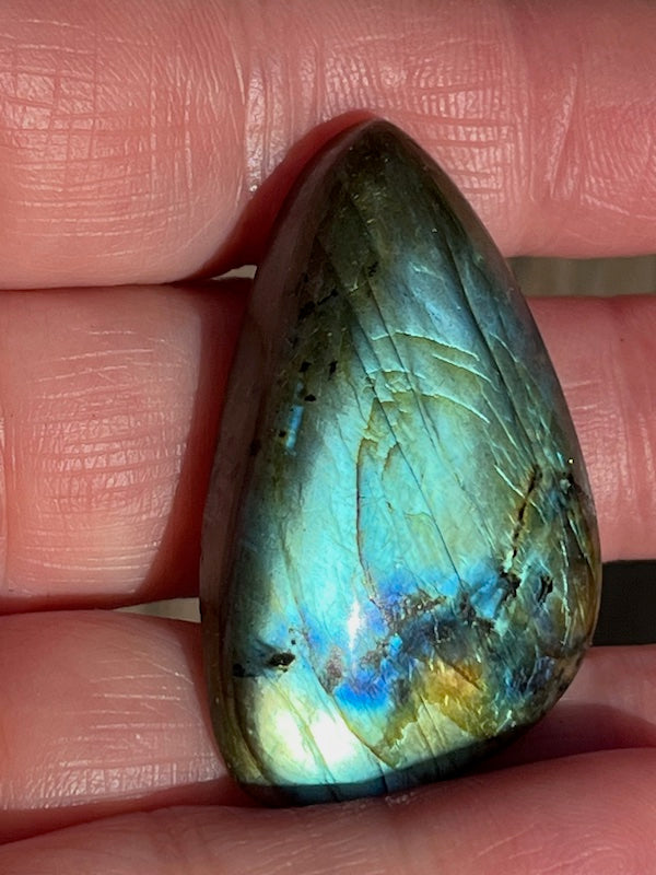 Labradorite Teardrop, Pear Cabochons with varing Blue, orange, yellow and purple flash.