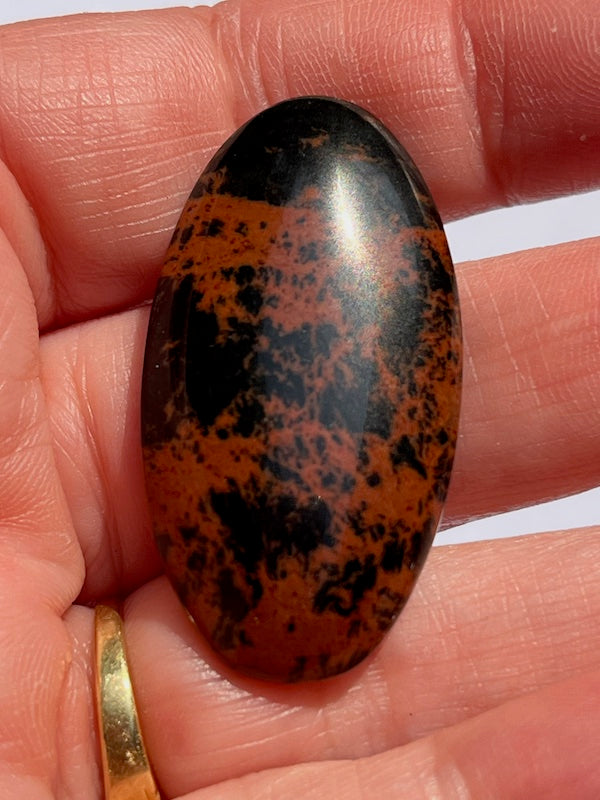 Mahogany Obsidian cabochons in a variety of sizes and shapes