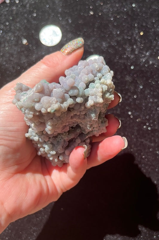 interesting peaks and valleys on this grape agate cluster