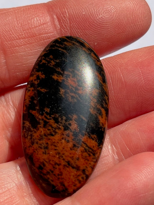 Mahogany Obsidian cabochons in a variety of sizes and shapes