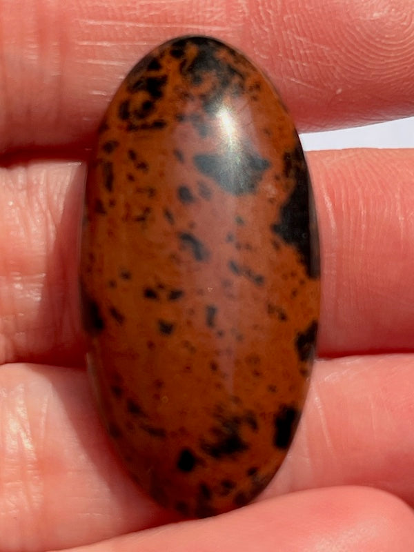 Mahogany Obsidian cabochons in a variety of sizes and shapes