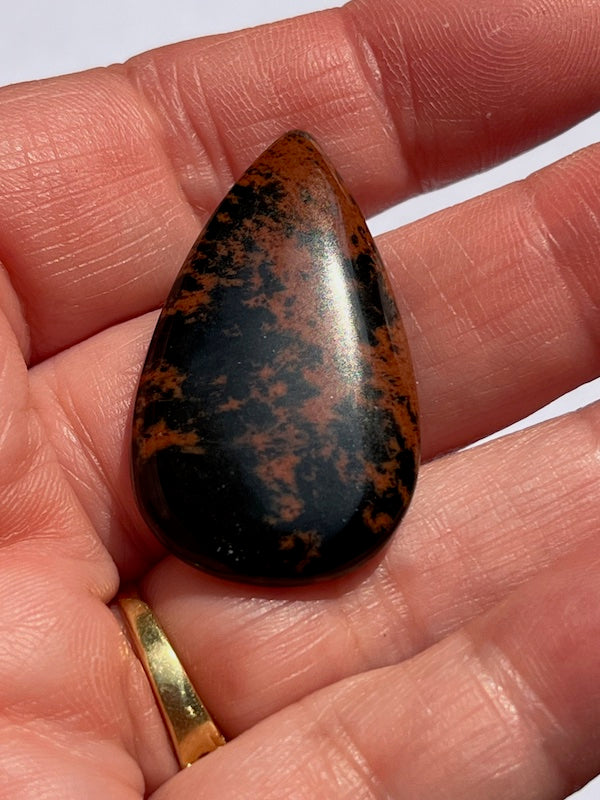 Mahogany Obsidian cabochons in a variety of sizes and shapes