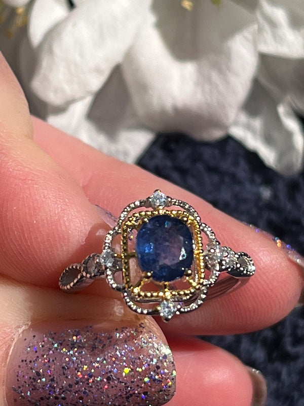 Oval natural sapphire sterling silver ring with cz and gold accents