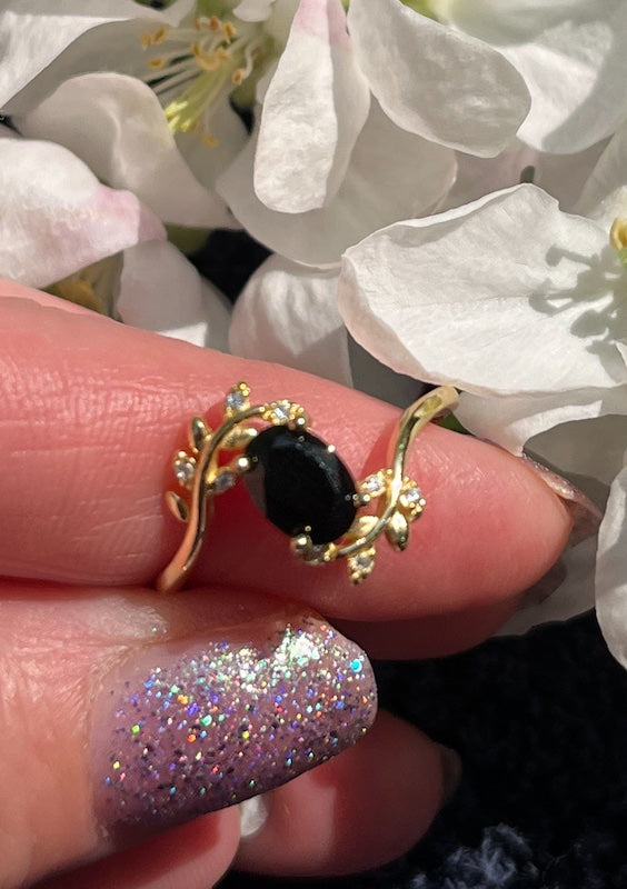 Ring, Black Spinel 5x7mm set in gold filled sterling silver. Size is adjustable